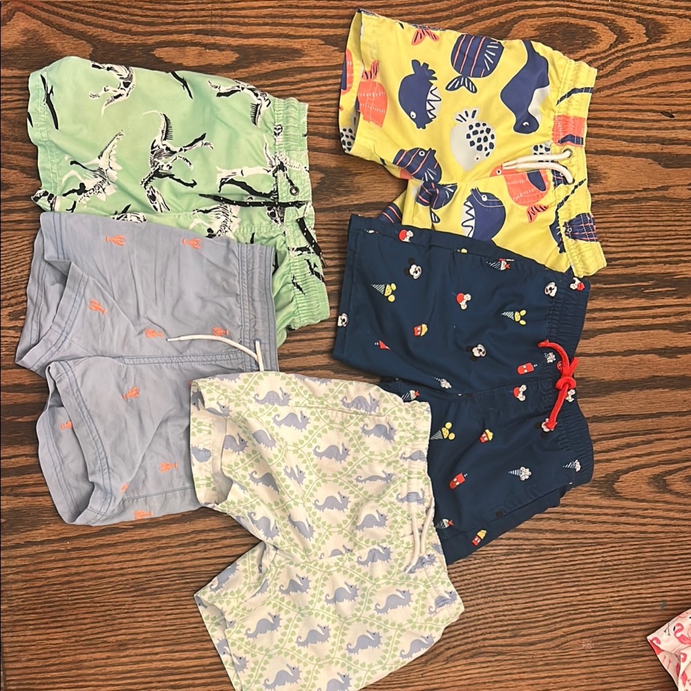 5 swimsuits, 2 are “3t”, 2 are “4t” and one is “2t” - to me they all fit like 4t